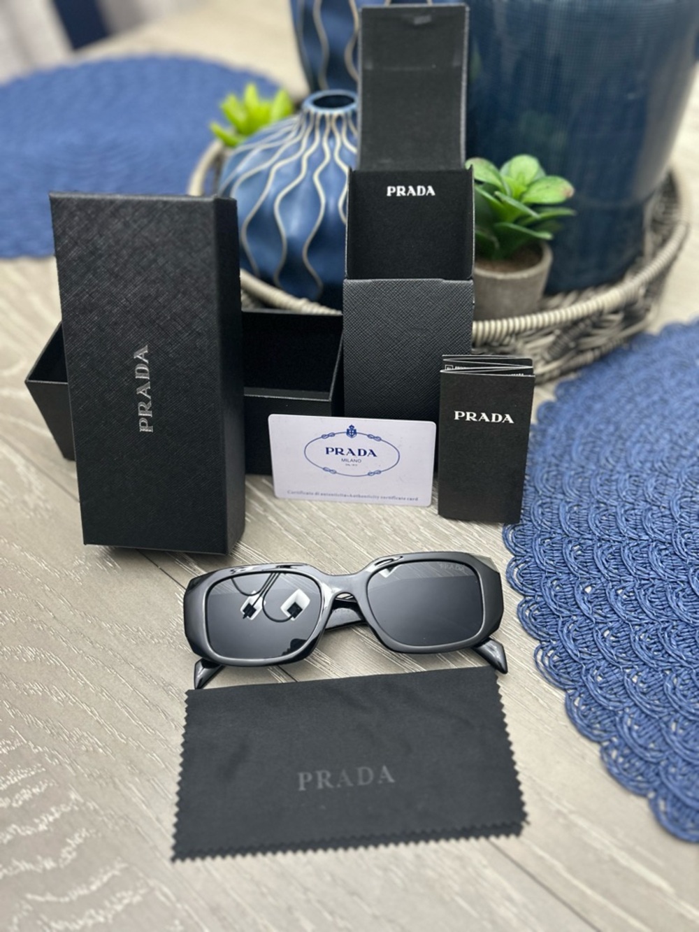 Prada Black Sunglasses with Dark Lenses